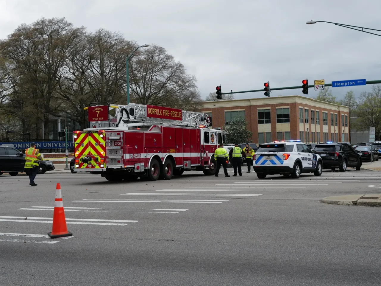 First responders block access to Old Dominion University's campus following an on-campus shooting on March 12. One person and the shooter died.