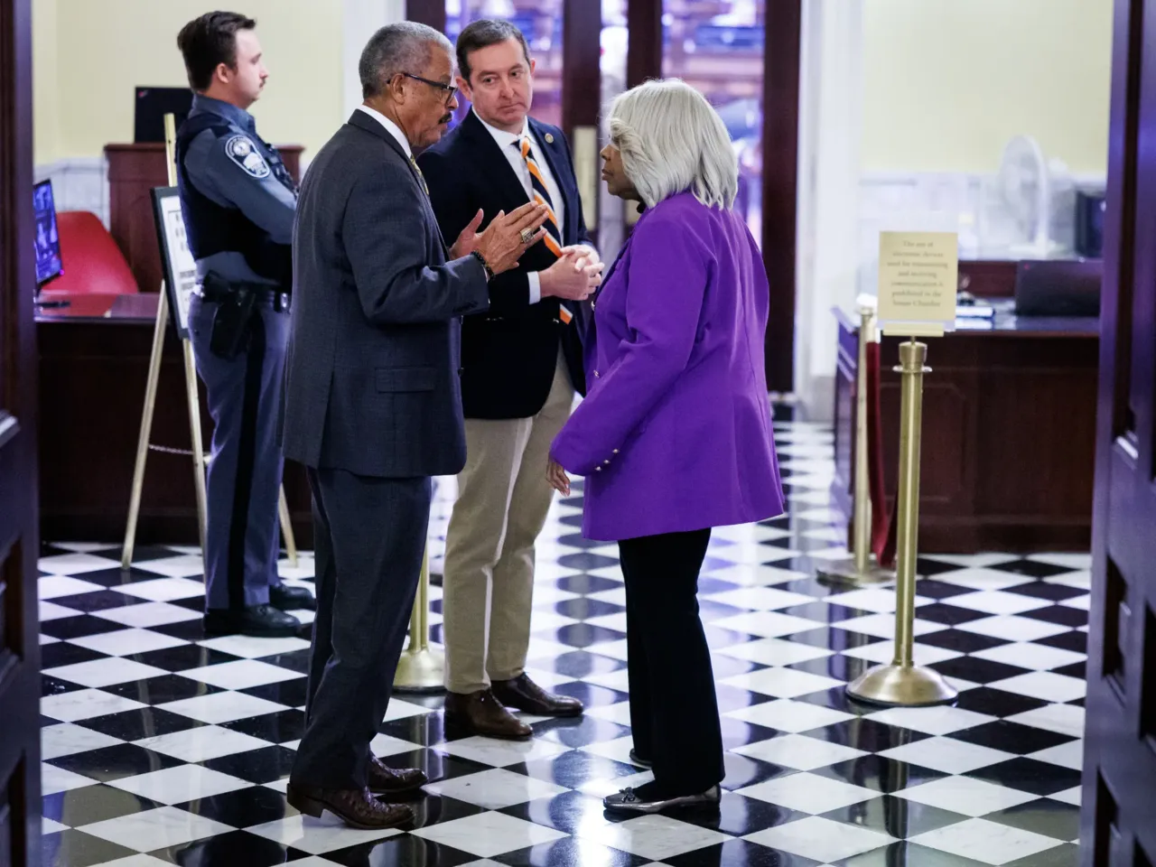House Appropriations Chair Luke Torian, D–Prince William, talks to Sen. Todd Pillion, R–Abingdon, and Senate Finance Chair Louise Lucas, D–Portsmouth, outside of the Senate chamber on Tuesday, March 10, 2026 at the Virginia State Capitol in Richmond.