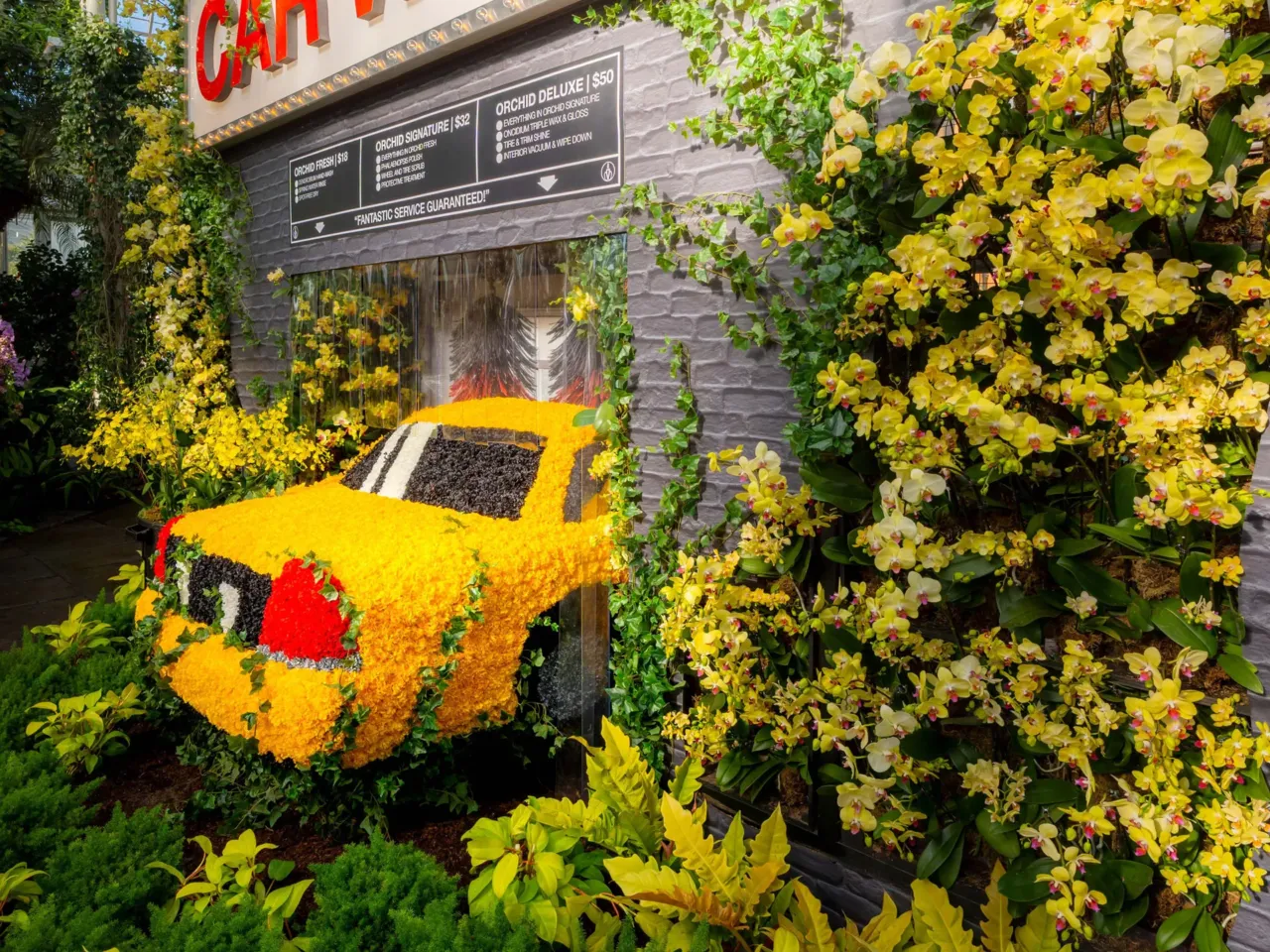 A mysterious floral artist brings beauty to fire escapes — and dumpsters 3 Mr. Flower Fantastic's installations pull from his childhood growing up in New York City — like this car wash. The taxi is made of both real and synthetic carnations.