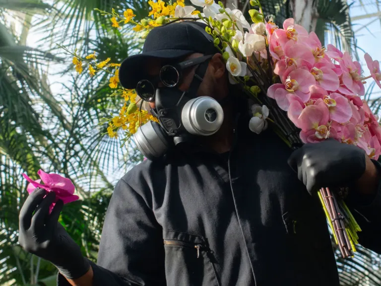 A mysterious floral artist brings beauty to fire escapes — and dumpsters