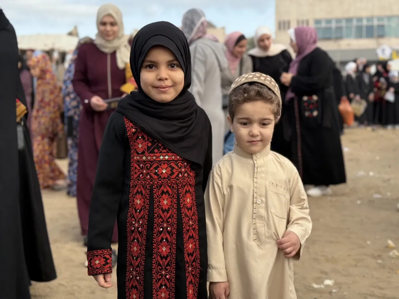 Palestinians celebrate Eid in Gaza, making the most of a fragile ceasefire 4 Children beamed in colorful new clothes for the Eid holiday.