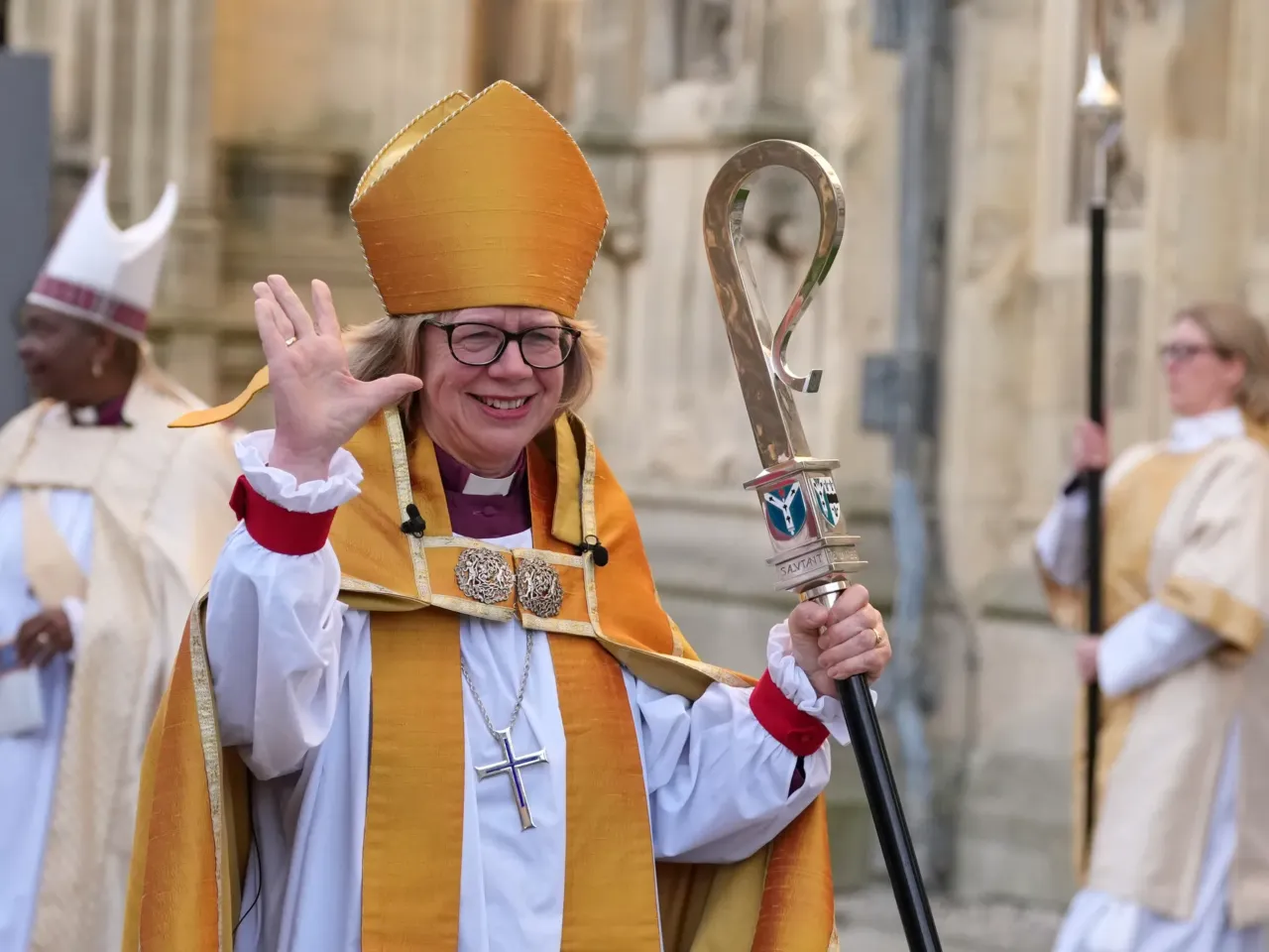 Sarah Mullally waves as she leaves after the Enthronement Ceremony installing her as archbishop of Canterbury in Canterbury, England on Wednesday, March 25, 2026. She is the first woman ever to lead the Church of England.