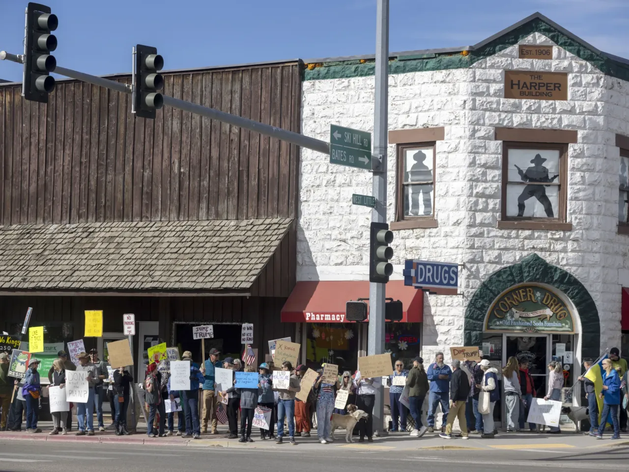 Protesters hold signs and chant slogans in Driggs, Idaho.