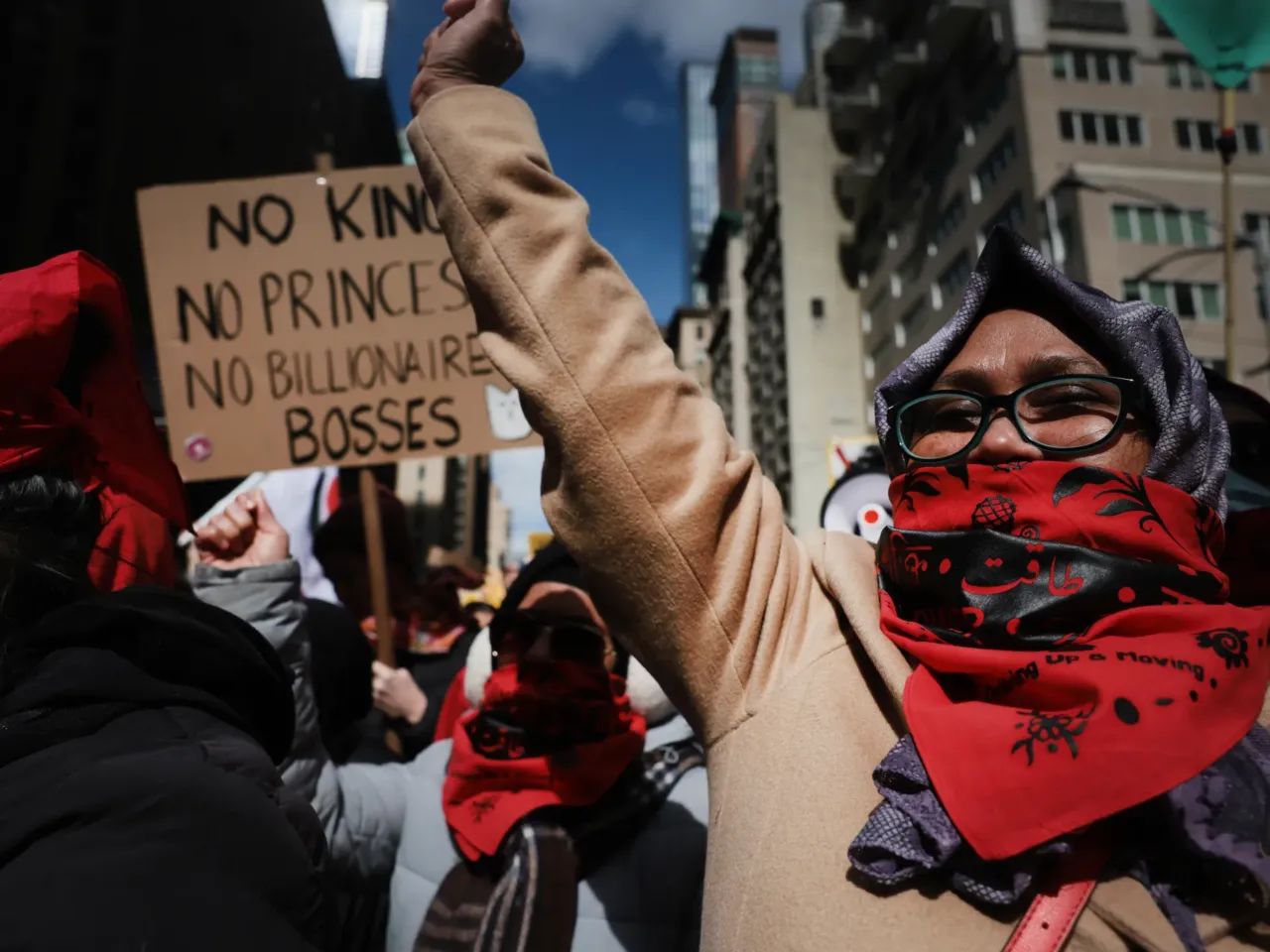 Demonstrators march down 7th Avenue and Broadway in Manhattan.