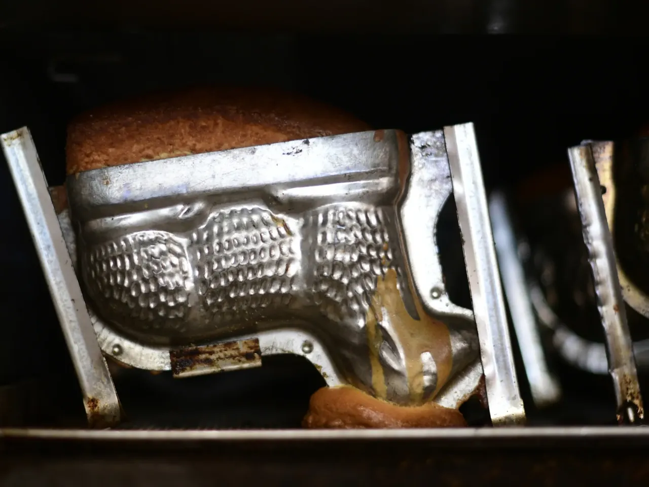 Buttercream wool and jelly bean eyes: The art of the Easter lamb cake 1 A baking form with traditional Easter cakes shaped as lambs is seen in an oven at the bakery Schuerener Backparadies in Dortmund, western Germany, on April 8, 2020.