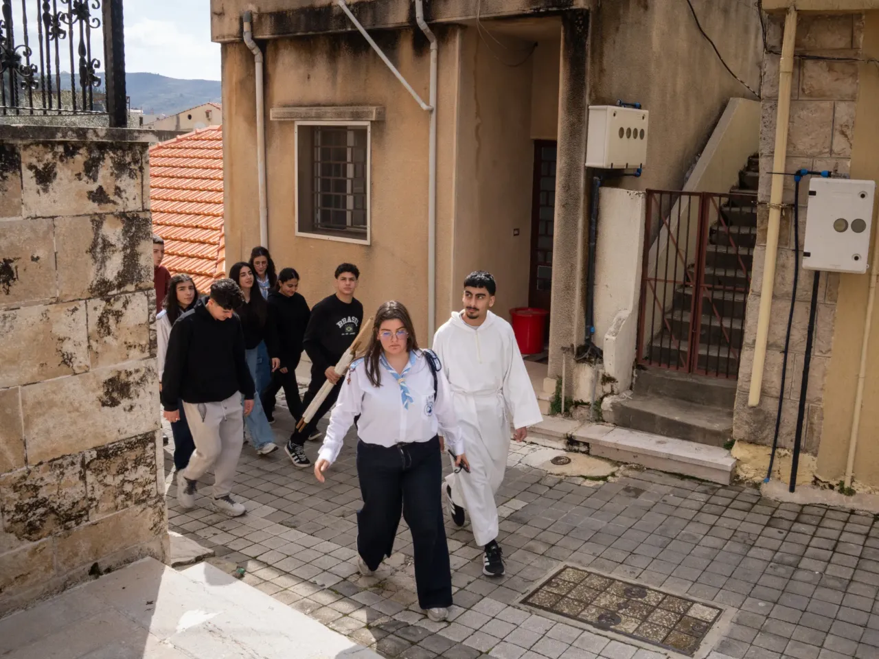 'Not our war' say Christians under siege this Easter, as Israel invades south Lebanon 6 Youth from the Maronite church in Jezzine celebrate Lazarus Saturday, the day before Palm Sunday, by going from house to house and performing the story of Lazarus rising from the dead.