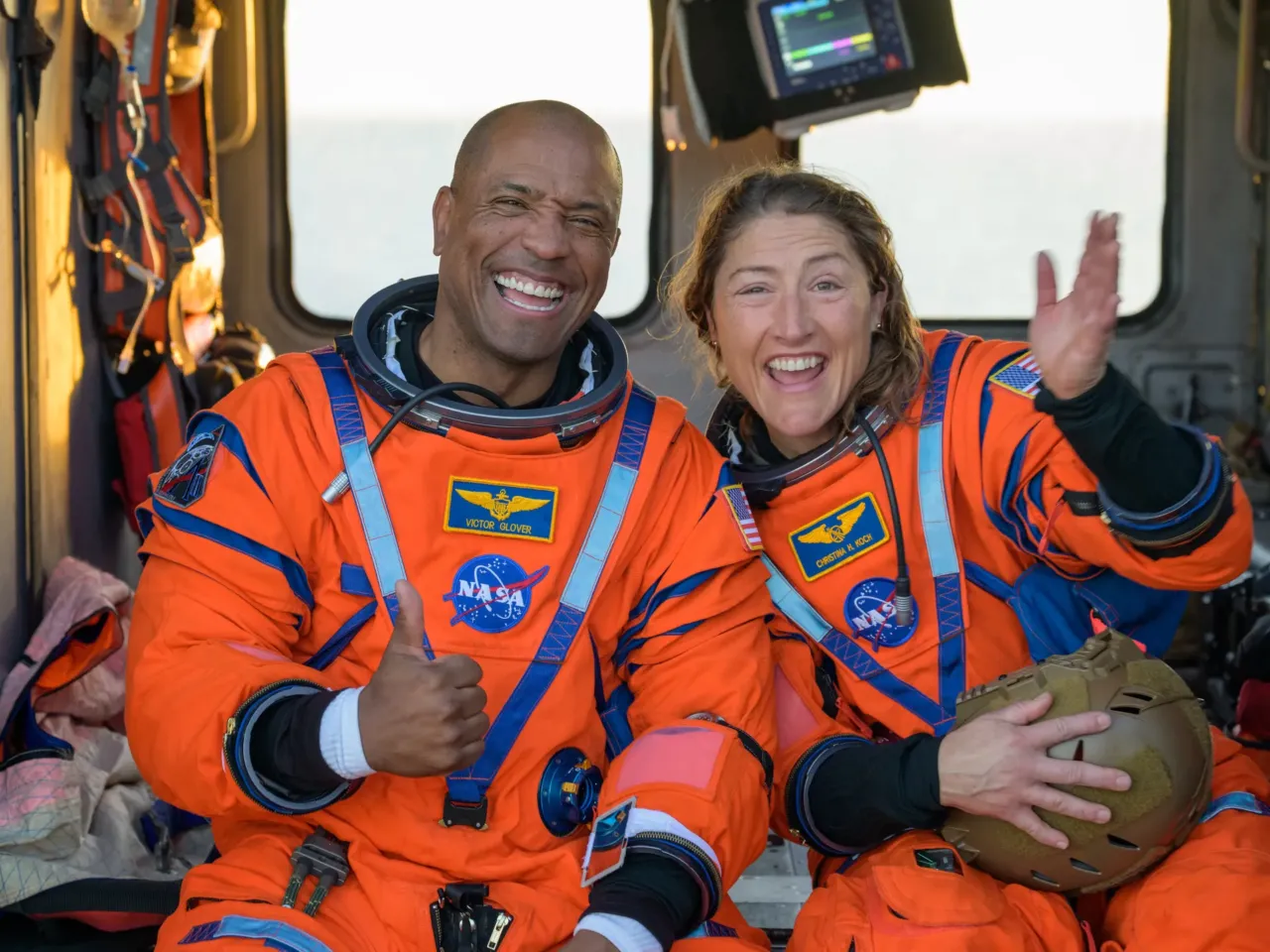 Artemis II splashdown captures nationwide attention 2 NASA astronaut Victor Glover, Artemis II pilot, left, and NASA astronaut Christina Koch, Artemis II mission specialist are seen sitting on a Navy MH-60 Seahawk from Helicopter Sea Combat Squadron (HSC) 23 on the flight deck of USS John P. Murtha.
