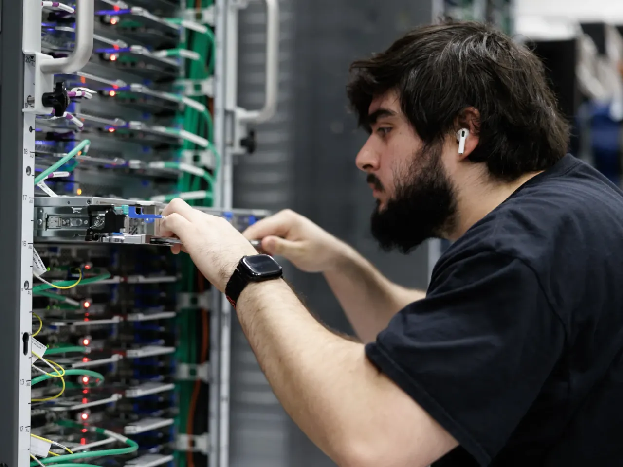 The Labor Department wants to teach you to use AI more. Here's what we found 1 An employee works a server rack at an Amazon Web Services lab in Austin, Texas, on February 3, 2026.