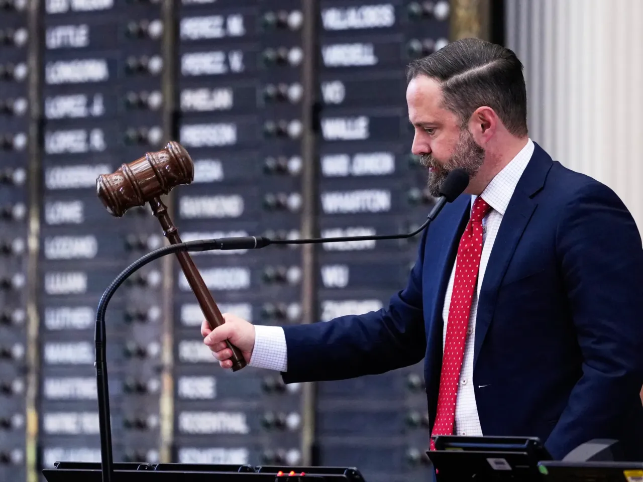 A local judge. A brash 82-year-old senator. State leaders have decided redistricting 3 Texas House Speaker Dustin Burrows oversees a debate during a special session in August. He accused Democrats of abandoning their duties when they fled the state to block the Republican Party's redistricting vote, and he said he'd sign arrest warrants for them.