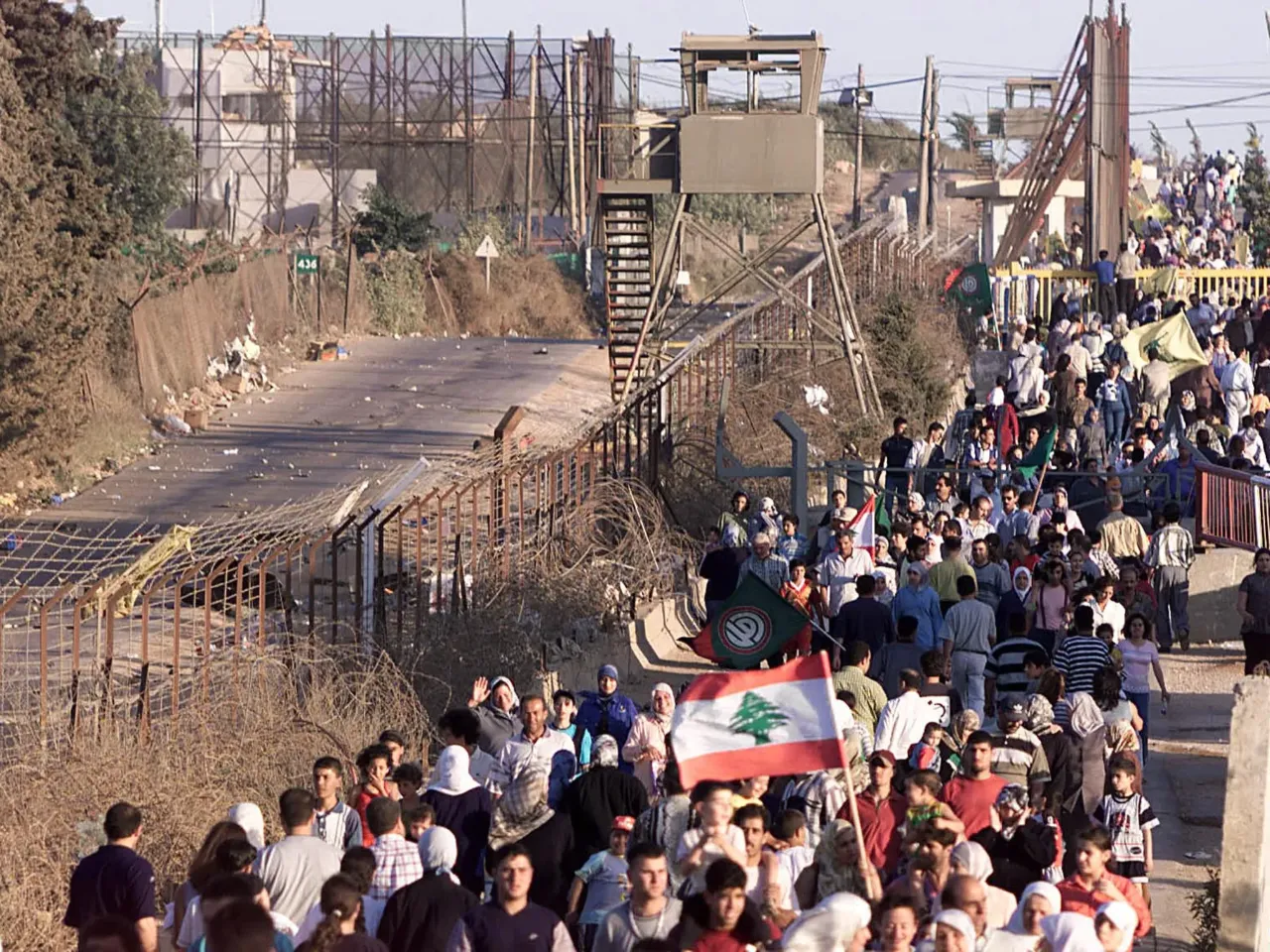 Born in south Lebanon, displaced to Beirut, two grandmothers reflect on Israeli invasions 3 Lebanese people walk near the border fence with Israel in Kfar Kela on May 28, 2000, following Israeli forces withdrawing from southern Lebanon days earlier.