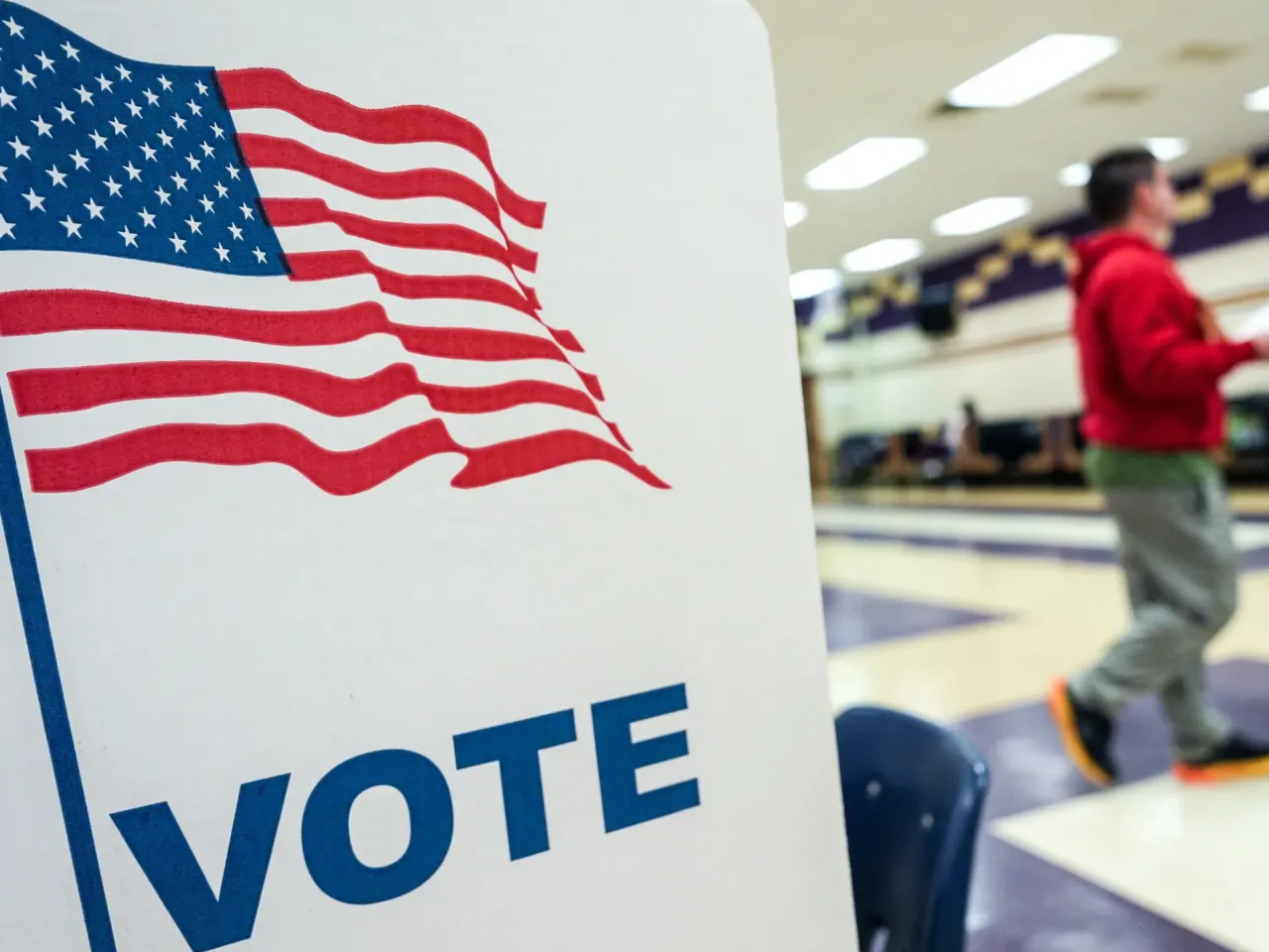 With Virginia vote, Democrats gain edge over Trump's national GOP redistricting push 2 A person votes in the Virginia redistricting referendum in Burke, Virginia.