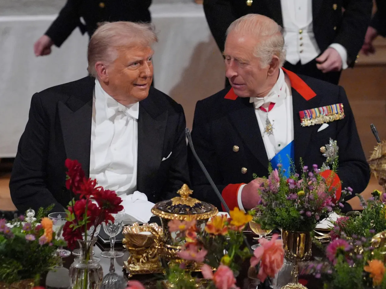 Britain's King Charles, right, and U.S. President Donald Trump speak at a State Banquet in Windsor Castle, England, on day one of U.S. President Donald Trump and First Lady Melania Trump's second state visit to the UK,  Sept. 17, 2025.