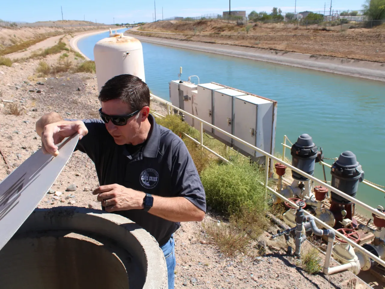 Shawn Kreuzwiesner, utilities director for the Town of Cave Creek, visits the town's pump system in Phoenix on March 27, 2026. Nearly all of the town's water flows through the pumps, which draw Colorado River water from the Central Arizona Project.
