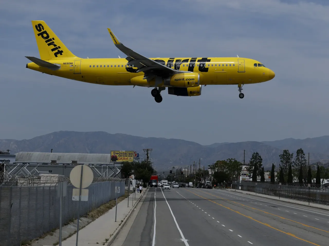 Spirit Airlines tried to be the Dollar General of the skies. Then the big airlines beat it at its own game 1 BURBANK, CALIFORNIA - APRIL 16: A Spirit Airlines plane lands at Hollywood Burbank Airport on April 16, 2026 in Burbank, California.