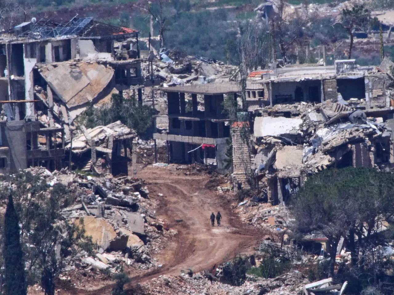 Two Israeli soldiers operate in southern Lebanon, as seen from northern Israel, April 29, 2026