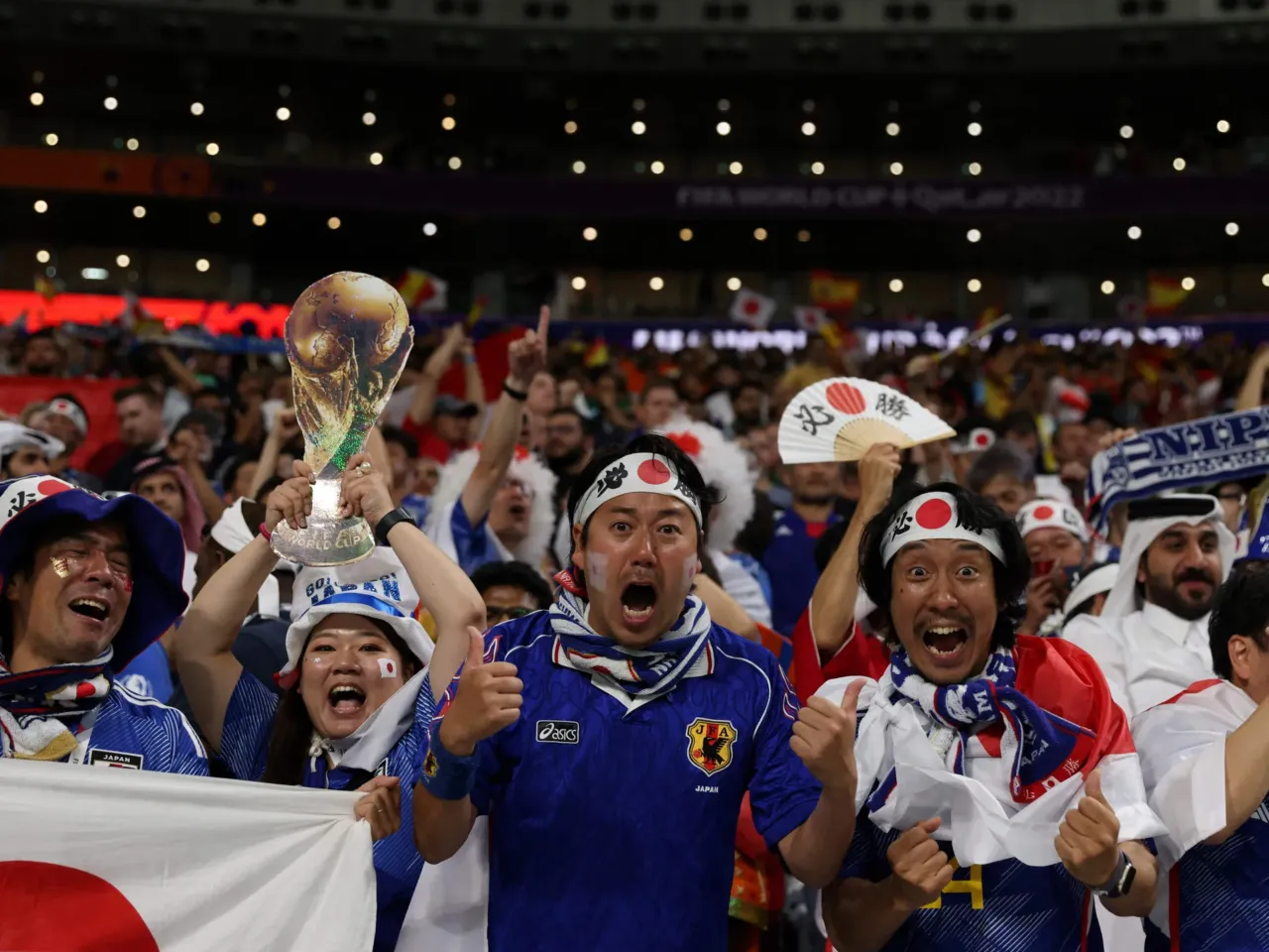 Hotels have a big World Cup problem: Bookings are running far below projections 1 Japan supporters celebrate after their team beat Spain at a 2022 World Cup game held at the Khalifa International Stadium in Doha, Qatar, on Dec. 1, 2022.