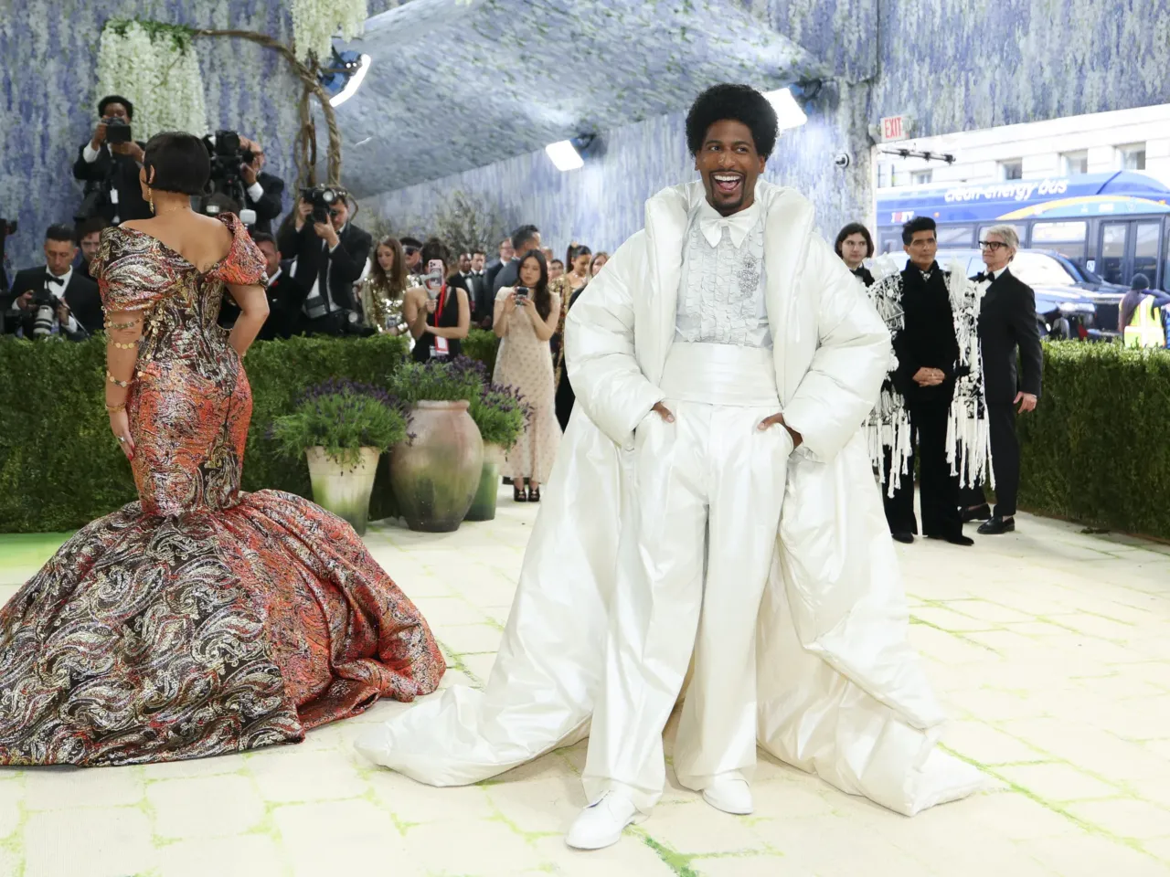 Musician Jon Batiste attends the 2026 Met Gala. His wife, author Suleika Jaouad, is on the left.