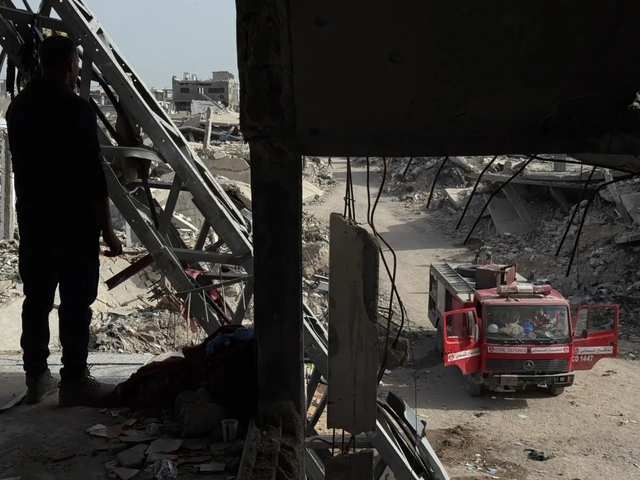 Skeletons in their clothing: Recovering bodies from the rubble in Gaza 9 Palestinian recovery crews work to recover bodies buried under the rubble of the Abu Naser family's apartment building, destroyed in an Israeli strike in October 2024 in northern Gaza.