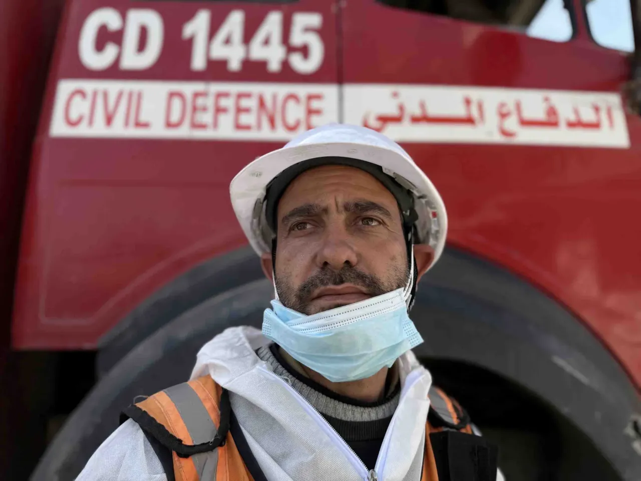 Skeletons in their clothing: Recovering bodies from the rubble in Gaza 4 Mohammed Abdulrahman, 32, a member of the Gaza civil defense crew, poses for a portrait during a mission to recover the bodies of victims of the Abu Naser family from beneath the rubble of their destroyed apartment building.