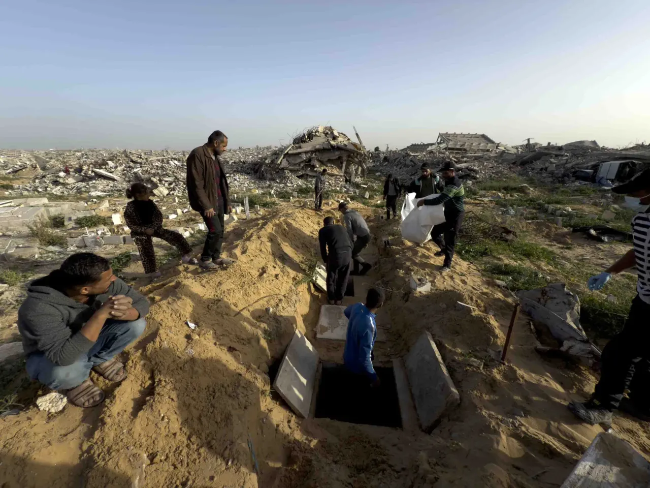 Skeletons in their clothing: Recovering bodies from the rubble in Gaza 12 Survivors dig new graves and gently lower into them bags of bones — bags that weigh almost nothing but mean everything to them.