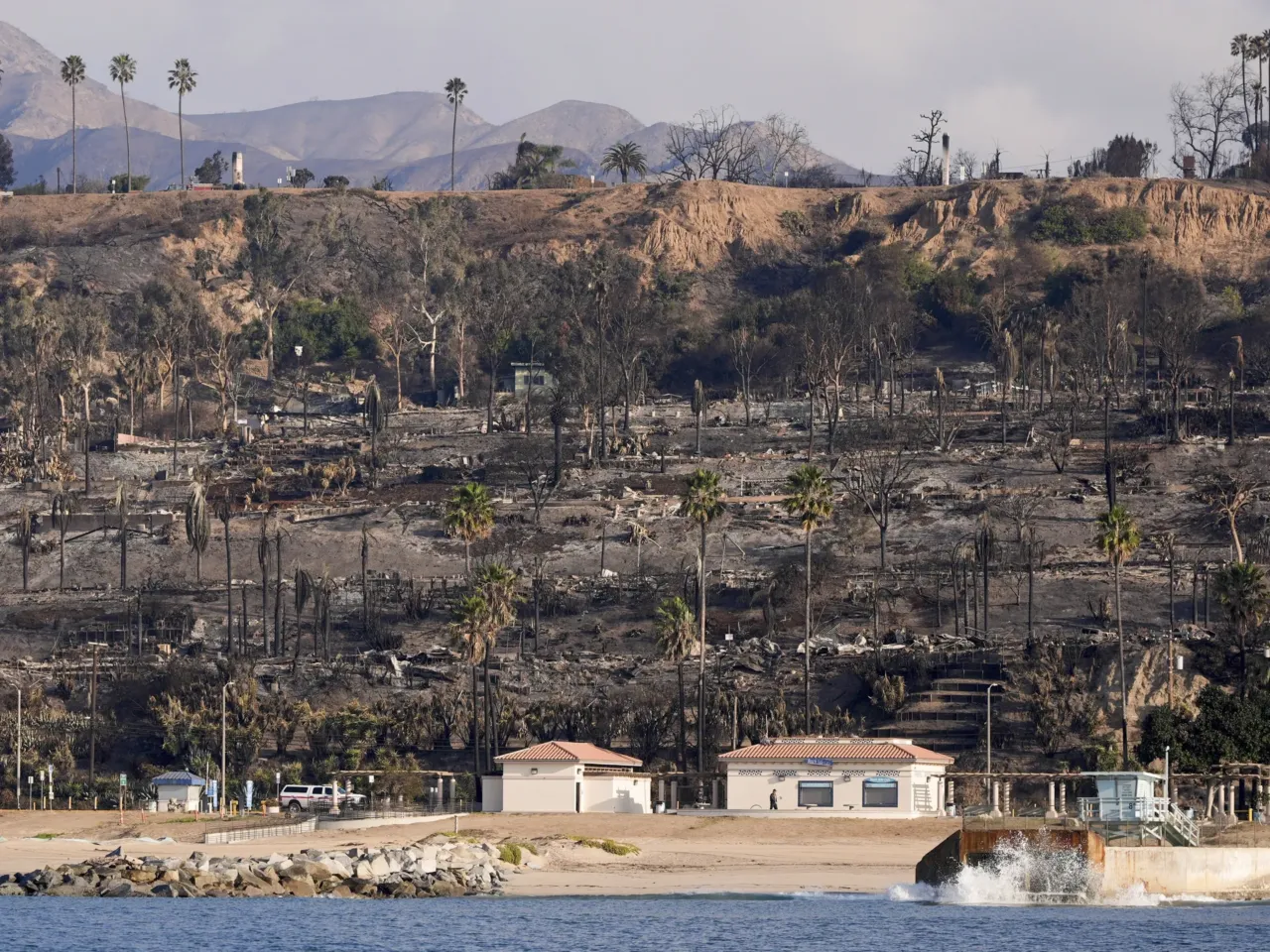 Properties damaged by the Palisades Fire in Los Angeles, Friday, Jan. 17, 2025. A council appointed by President Trump is recommending that FEMA make it easier for disaster survivors to access money for housing.