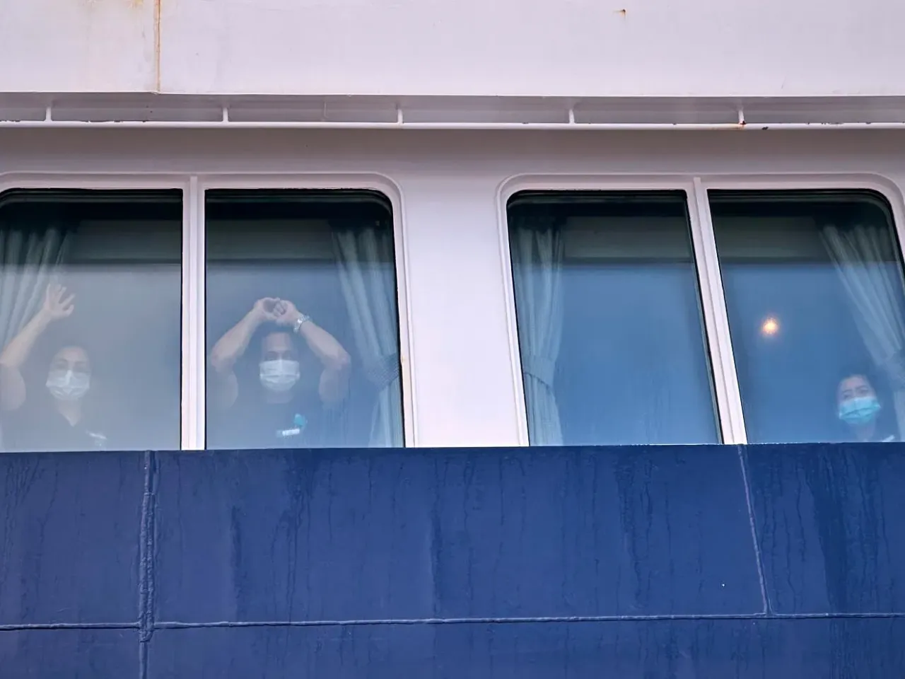 Passengers from virus-hit cruise ship fly home as CDC says outbreak threat is low 2 Passengers watch as others are disembarked from the hantavirus-stricken cruise ship MV Hondius at the port of Granadilla in Tenerife, Canary Islands, Spain, Sunday, May 10, 2026.