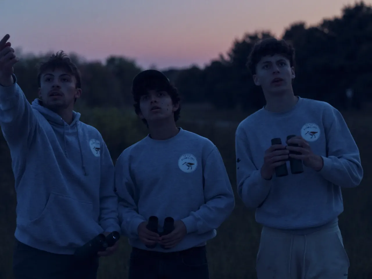 24 hours with 3 teenage birders: Welcome to the World Series of Birding 10 Trojan (left), Pacetti and Train look for a nighthawk at Edwin B. Forsythe National Wildlife Refuge after the sun set.
