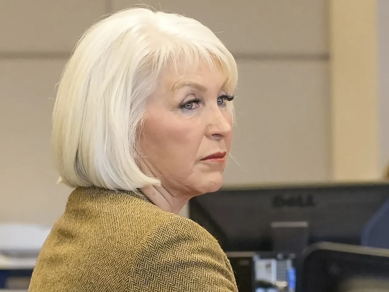Tina Peters, former Mesa County, Colo., clerk, listens during her trial on March 3, 2023.