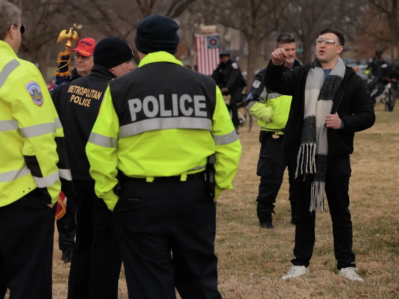 Police sue Trump as Jan. 6 rioters gloat over 'weaponization' fund 3 Jake Lang (right), who was charged with eight counts of assaulting officers before his pardon, threatens D.C. Metropolitan Police officer, including Commander Jason Bagshaw (left), during a Jan. 6 rally and memorial march marking five years since the attack on Jan. 6, 2026 in Washington, D.C.