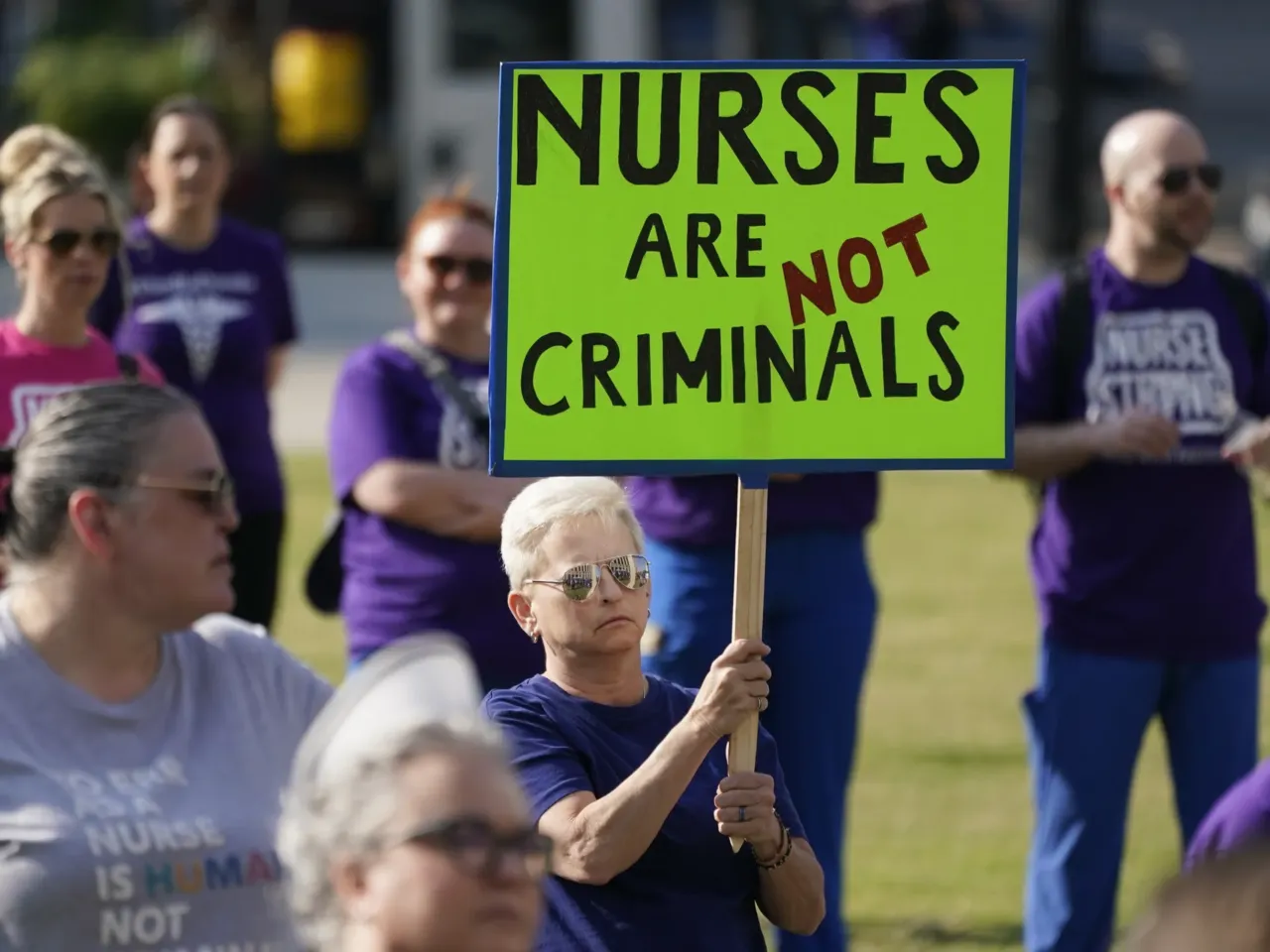 People demonstrate outside the courthouse where the sentencing hearing for former nurse RaDonda Vaught was held on May 13, 2022, in Nashville, Tenn.