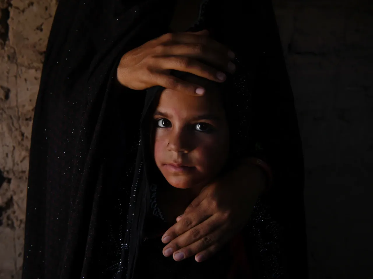 Six-year-old Farzana was a child bride, pledged by her father to a 13-year-old boy for a sum equivalent to approximately $60. After repeated appeals from Farzana's mother, tribal chiefs intervened and raised enough money to buy Farzana back and stop the marriage.
