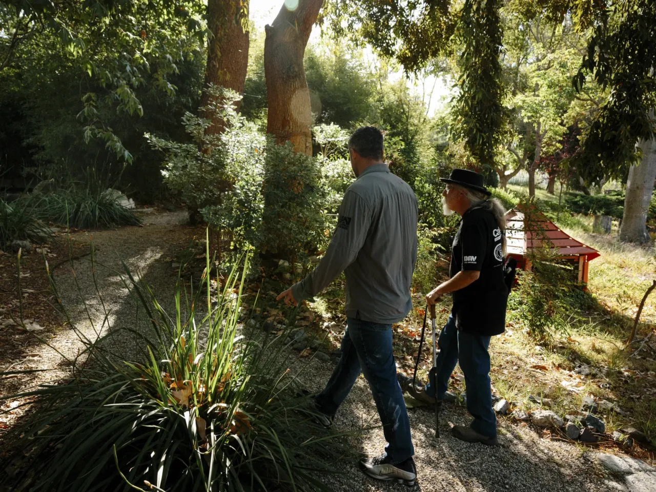 For veterans, a place where peace can take root 7 John Follmer and volunteer Andrew Blume discuss garden maintenance work for the day at the Japanese garden on the VA campus in Los Angeles in April.