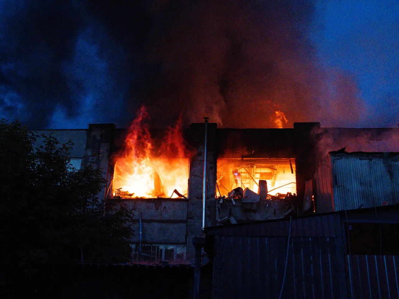 Flames engulf a building after the attack in Kyiv, Ukraine.