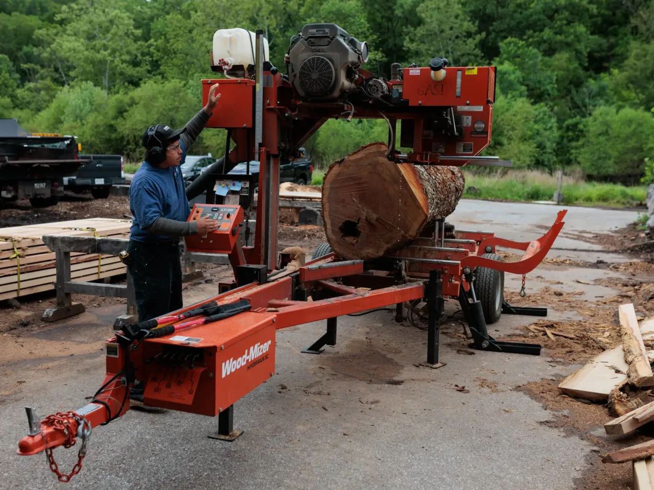 The Forest Service wants to close research hubs to save money. That could be costly 4 Saul Esparza uses a portable bandsaw mill at Camp Small, a wood recycling facility run by the Baltimore City Department of Recreation and Parks, with early assistance from Forest Service researchers.