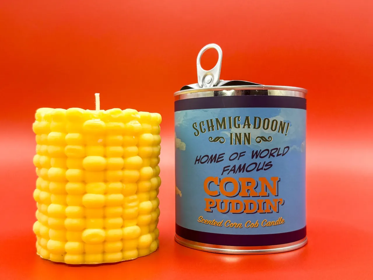 This "Corn Puddin'" candle is sold at Broadway's Schmigadoon!