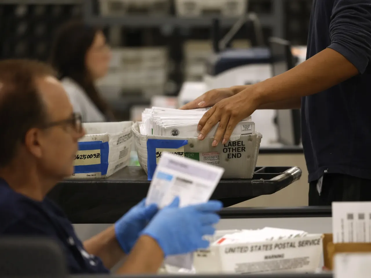 Kalshi and Polymarket crack down on paid influencers claiming election fraud 2 Election workers process ballots for the California state primary election at the Los Angeles County Ballot Processing Center on June 5, 2026 in City of Industry, California.