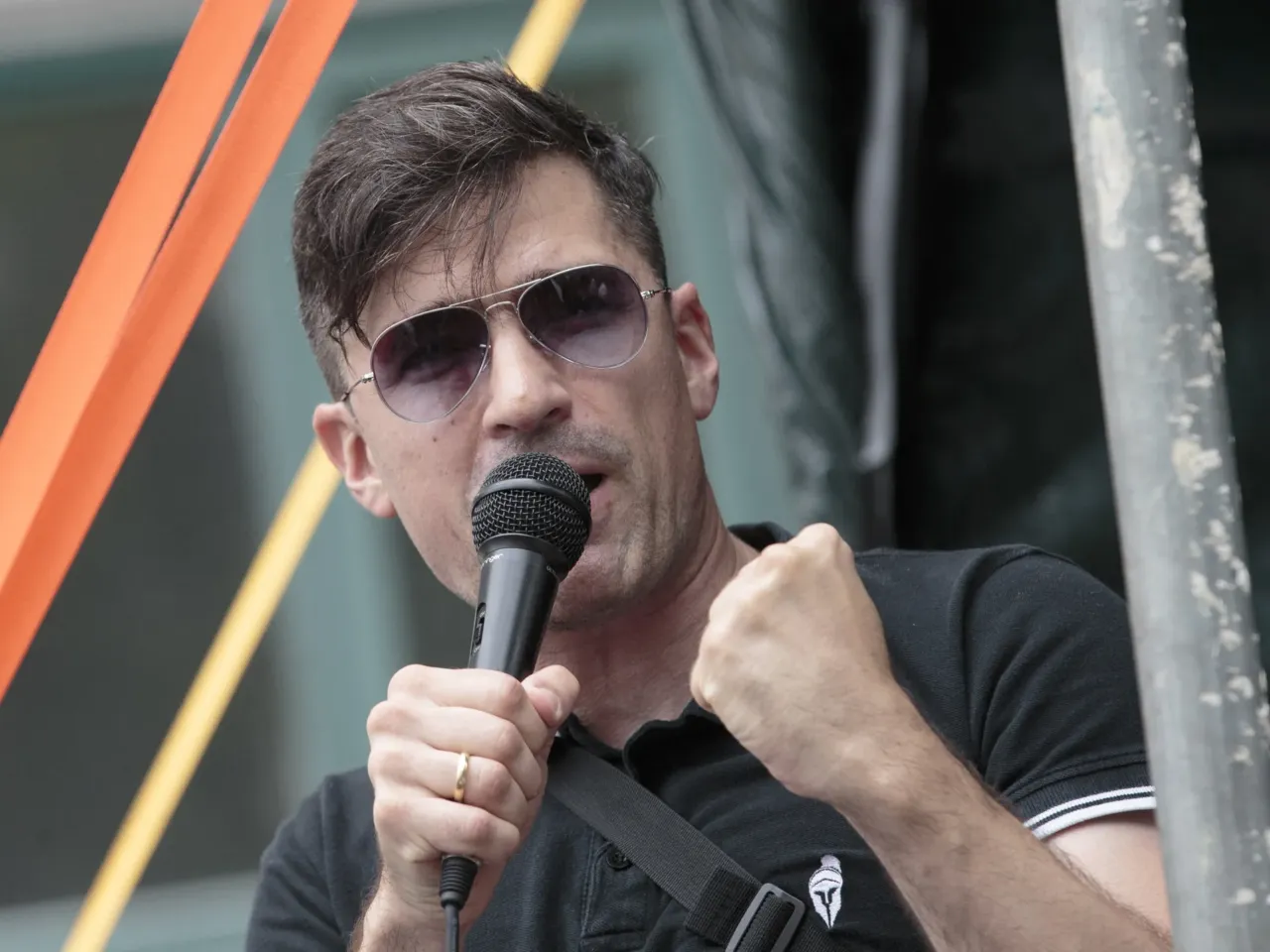 Martin Sellner, Austrian far-right activist, addresses demonstrators at a rally of the far-right Identitarian Movement Austria on July 26, 2025 in Vienna, Austria.