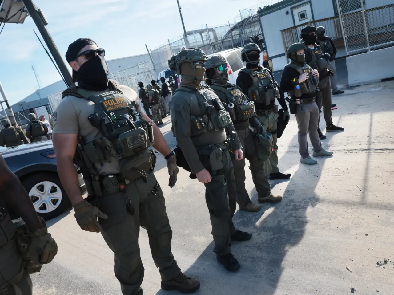 ICE agents confront protesters as they gather outside the federal immigration center at Delaney Hall on June 8, 2026, in Newark, New Jersey. The agency will receive tens of billions in new funding through the end of Trump's term under a GOP bill passed by Congress.