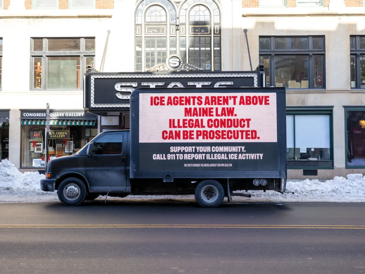 A mobile billboard that reads "ICE agents aren't above Maine Law. Illegal conduct can be prosecuted" is seen on January 30, 2026 in Portland, Maine.