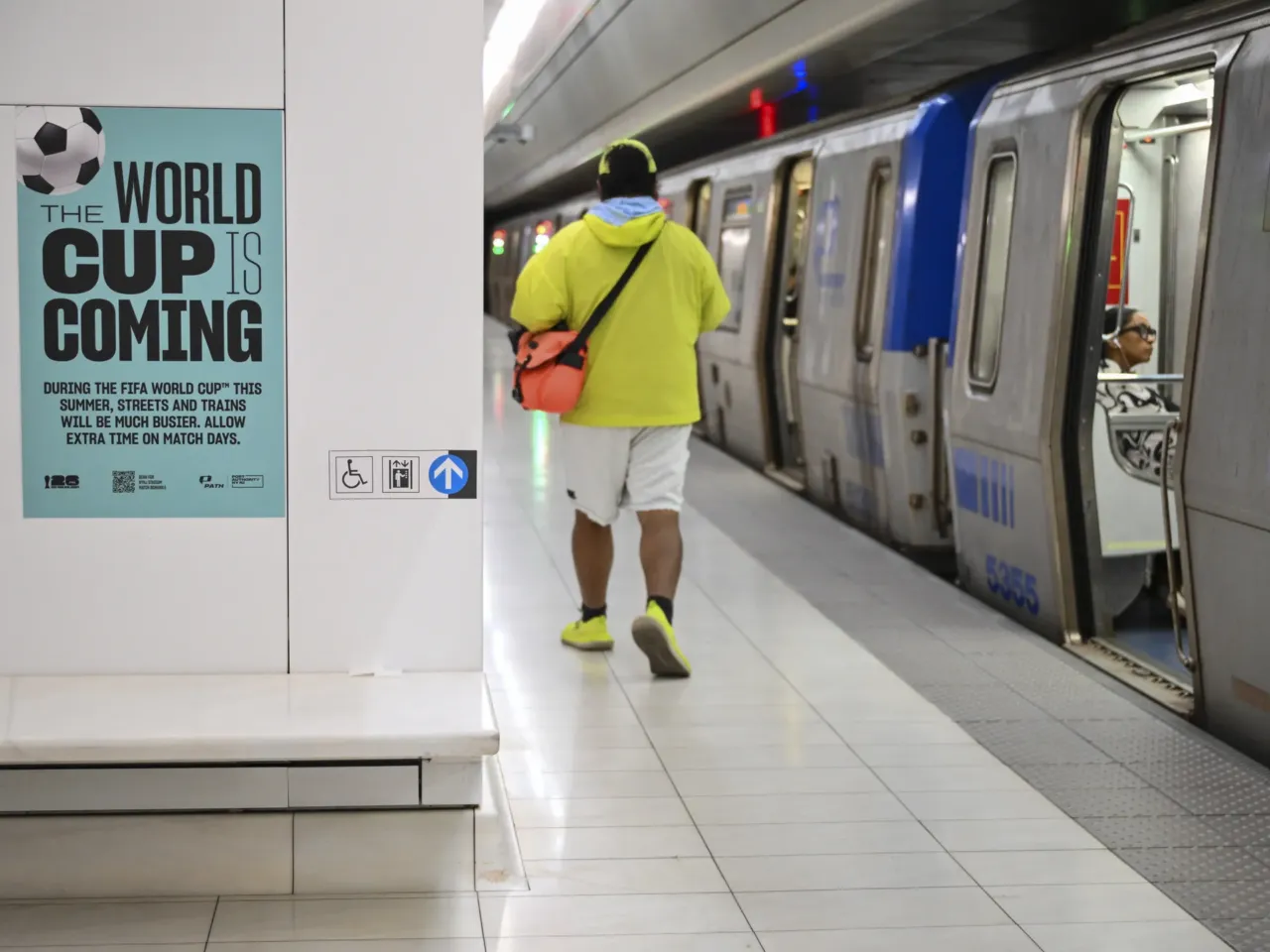 As costs add up, some in New Jersey are fuming about the World Cup 1 A sign promoting the 2026 FIFA World Cup is seen in the PATH train station at the World Trade Center hub in New York on May 30.