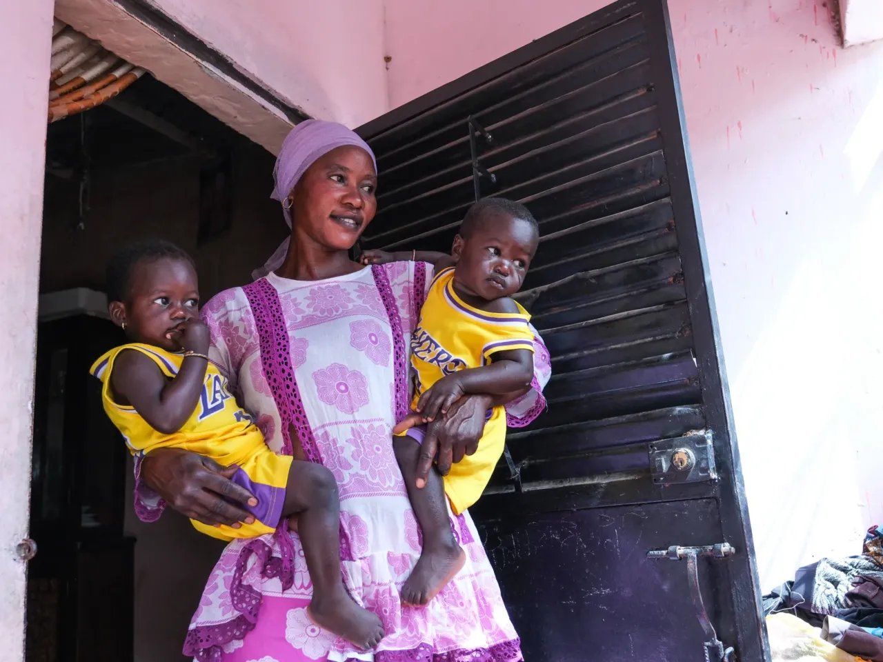 A plan to get lifesaving food to hungry kids was working well -- until it wasn't 2 Yacine Lo and her twin children, Mame Diarra and Mame Khadim.