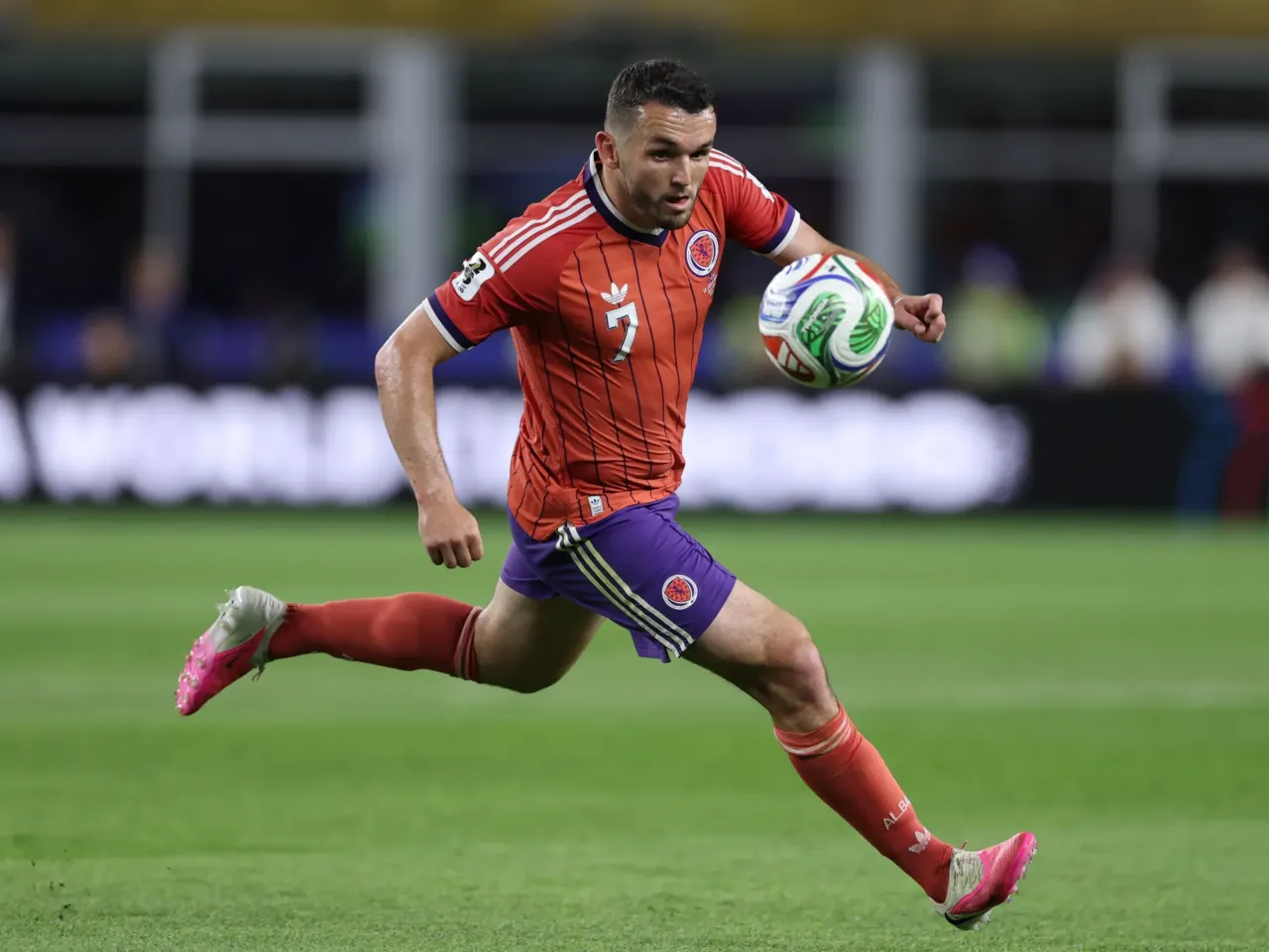 John McGinn of Scotland controls the ball during the team's opening World Cup match against Haiti on Saturday in Foxborough, Mass.