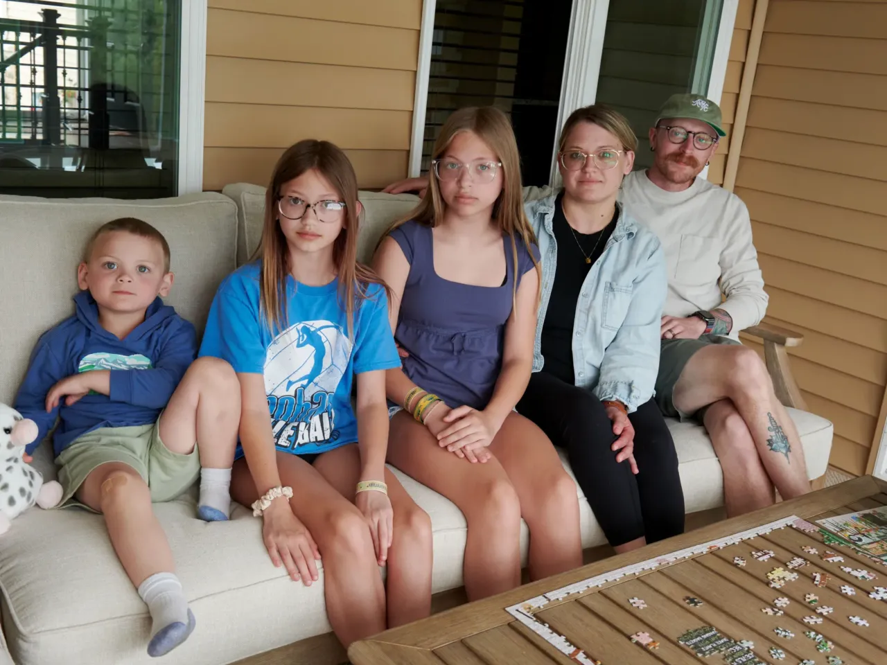More people are juggling work and kids. Many are finding they can't give 100% to both 3 Jack, 4, Eden, 11, and Piper, 12, sit with their parents Amber and Neil Petersen.