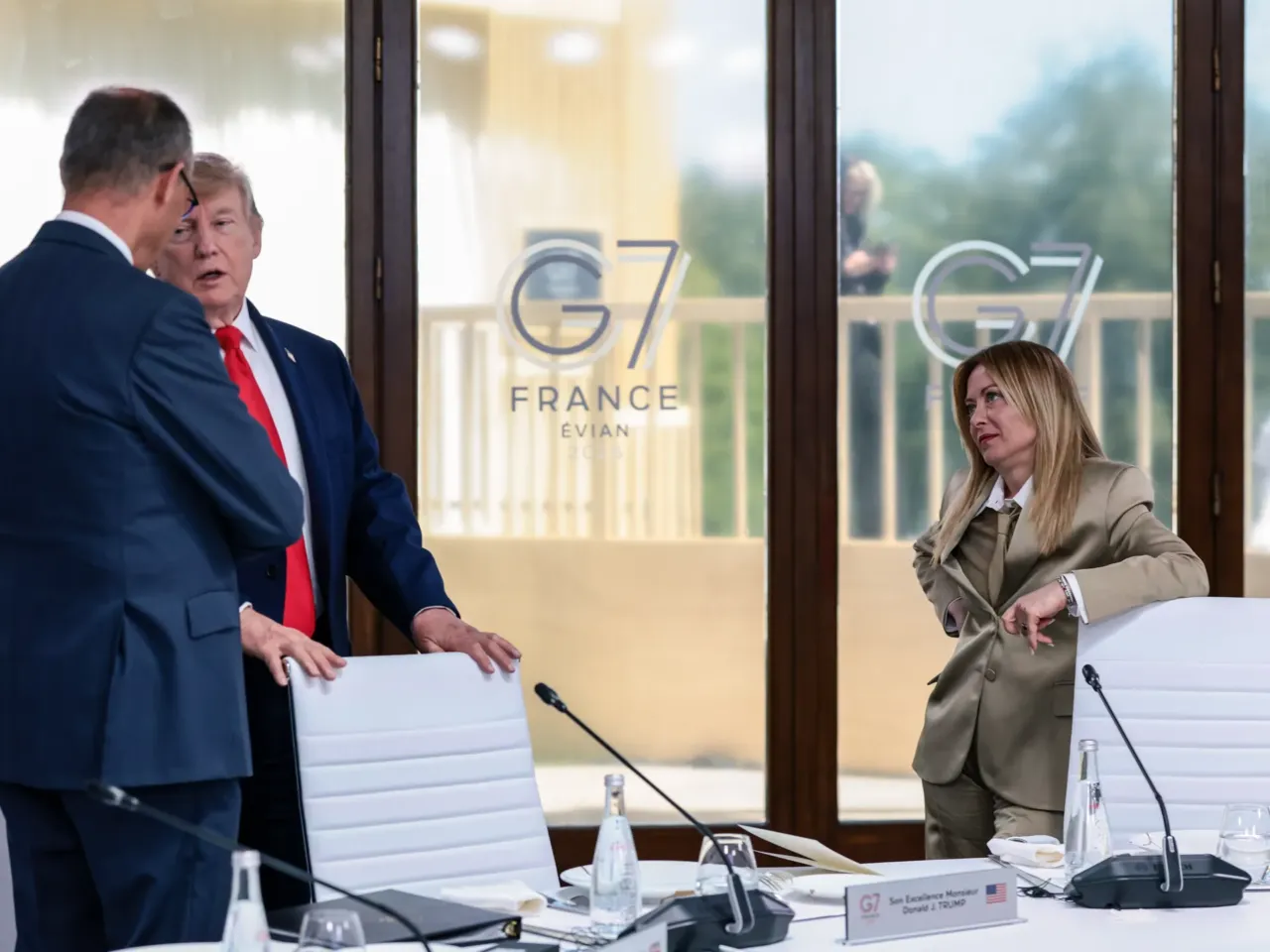 Italy's Meloni, once Trump's closest ally in Europe, says he made up a story about her 1 President Donald Trump speaks with German Chancellor Friedrich Merz as Italian Prime Minister Giorgia Meloni looks on at the G7 meeting in Evian, France, on June 16.