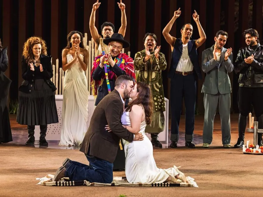 Oscar Diaz and Janelly Mendoza (kneeling), from Laredo, TX, were married on stage on June 11, after a performance of Romeo and Juliet at the Public Theater's Delacorte Theater, (would add: in New York)