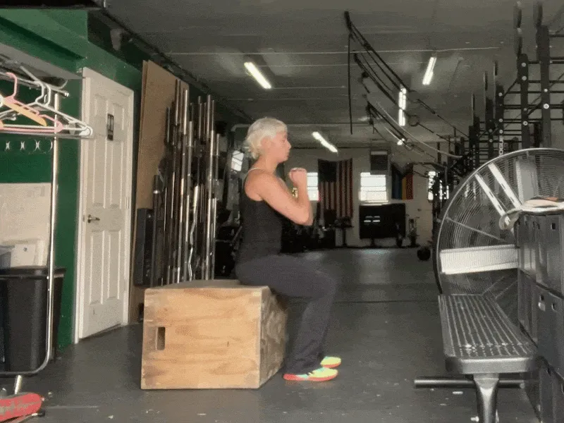 The sit-to-stand movement, demonstrated above, is one way to hone your explosive power, or your body's ability to rapidly generate a lot of force. Scroll down for more recommended exercises.