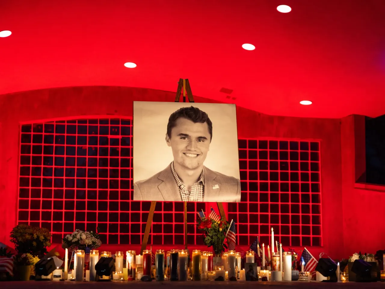 A photo of Charlie Kirk, 31, is seen at his makeshift memorial at Orem City Center Park in Orem, Utah, on Sept. 11, 2025, one day after he was shot during a public event at Utah Valley University.