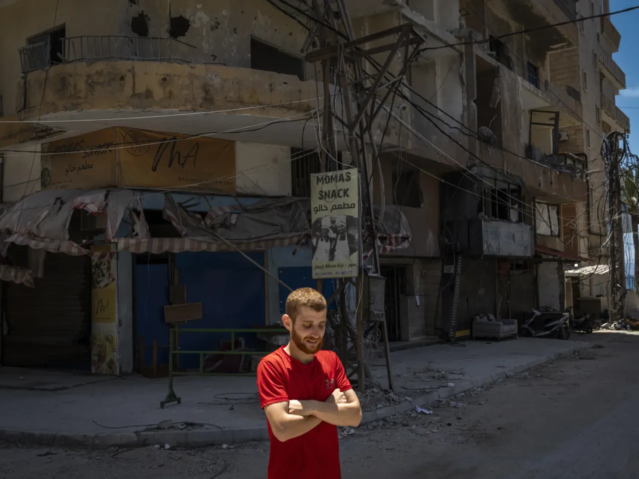 Lebanese struggle to get by in an ancient city under Israeli evacuation order 2 A resident walks through the nearly empty, ghostlike streets of Tyre during an evacuation warning on June 7.