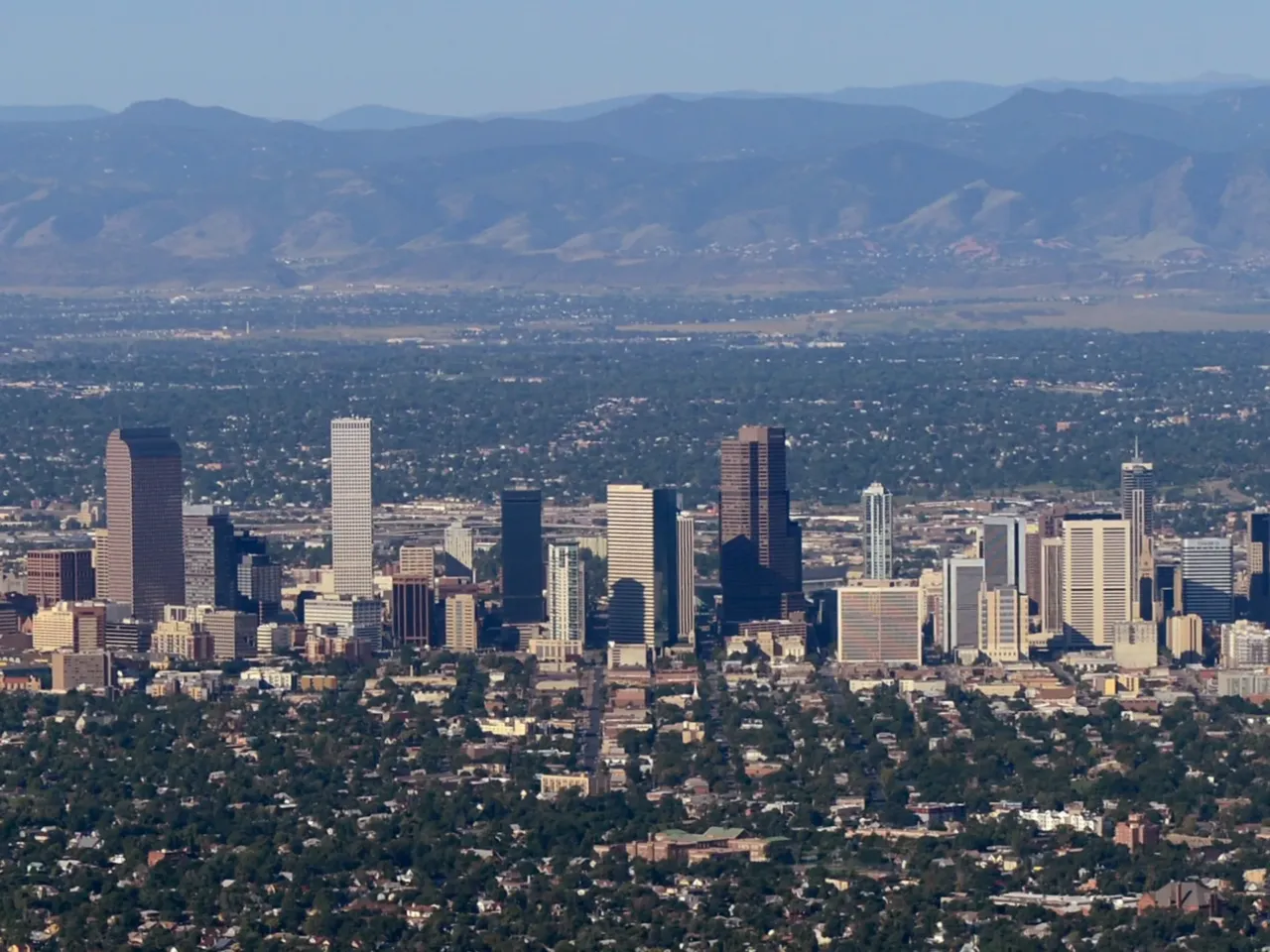 When falling housing prices are good news — and when they're not 2 The downtown Denver skyline is seen from the air.