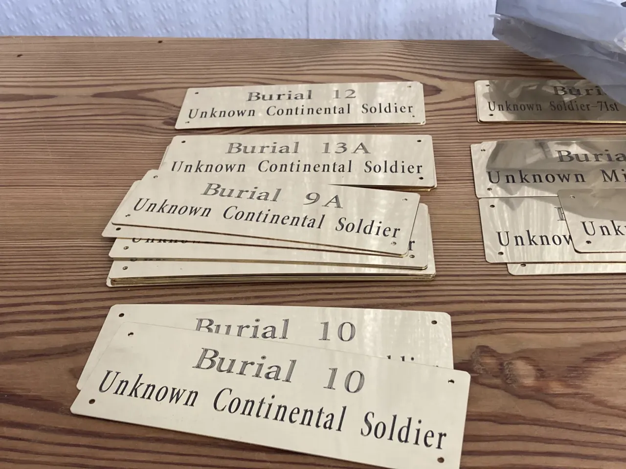 Plaques to help identify 14 unknown soldiers who were found at the site of the Battle of Camden and are being reburied are seen on Thursday, March 30, 2023, in Columbia, South Carolina. DNA analysis has recently identified one of them.